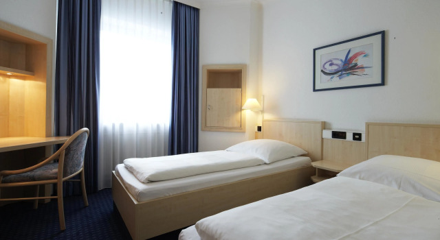 Номер Standard Rugs Hotel Augsburg, Trademark Collection by Wyndham