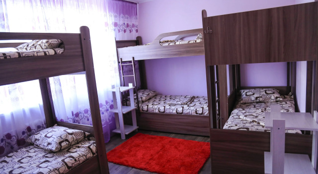Кровать в общем номере Champion Hostel