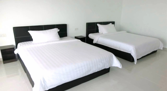 Четырёхместный номер Standard Цокольный этаж Kukup Xiang Holiday Home