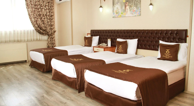 Трёхместный номер Kozan City Hotel