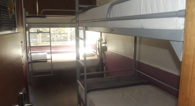 Кровать в общем номере Guanako Rooftop Hostel