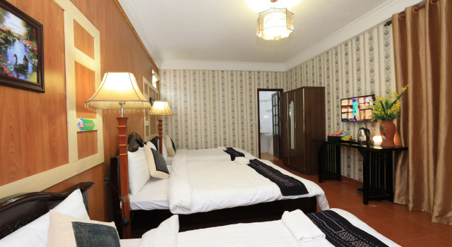 Кровать в общем номере Lasapa Hotel