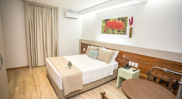 Кровать в общем номере Hotel Pousada do Bosque