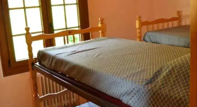 Кровать в общем номере Albergue Velarta