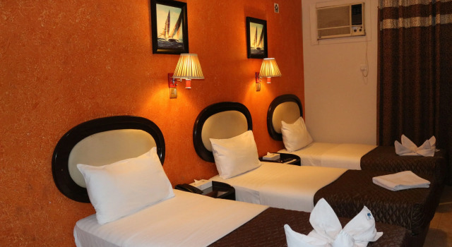 Трёхместный номер Grand Sina Hotel