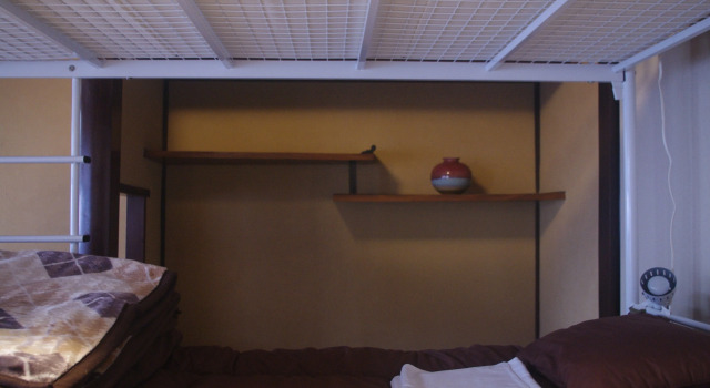Кровать в общем номере Kominka Guesthouse Hagi Akatsukiya