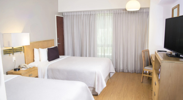 Четырёхместный номер Deluxe iStay Hotel Monterrey Histórico