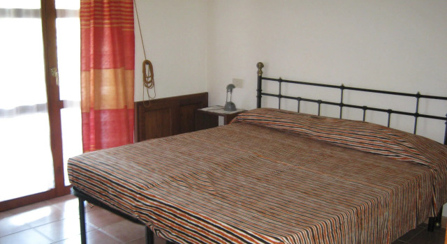 Кровать в общем номере Agriturismo Il Corniolo