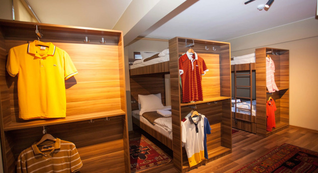 Кровать в общем номере Juliet Rooms & Kitchen