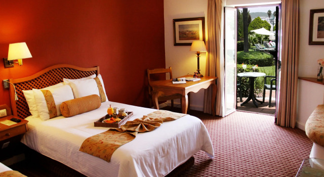 Четырёхместный номер Deluxe Hotel Misión Grand Juriquilla