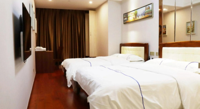 Четырёхместные апартаменты Shengang Executive Apartment - Shenzhen The Mixc