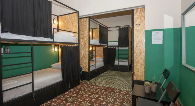 Кровать в общем номере Intra Muros Hostel
