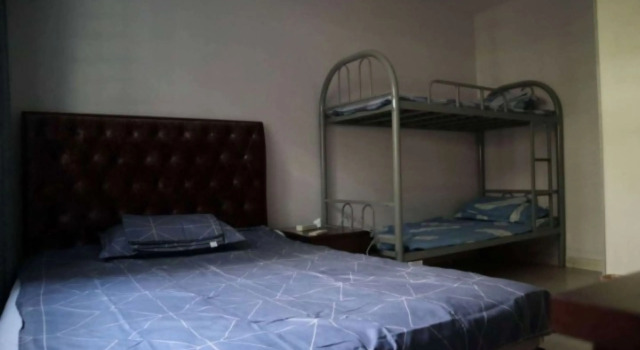 Кровать в общем номере Manyuge Youth Hostel