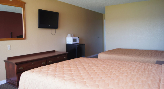 Четырёхместный номер Standard Holiday Lodge & Suites