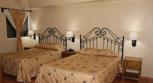 Четырёхместный номер Standard Hotel Hacienda del Sol