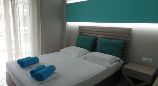 Четырёхместный номер Standard Ouzas luxury Hotel