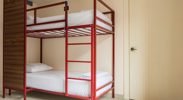 Кровать в общем номере Hotel Brio Centro