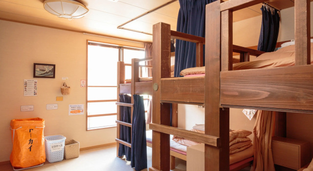 Кровать в общем номере Komorebi Hostel