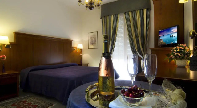 Трёхместный номер Standard с балконом и с красивым видом из окна Hotel Posta