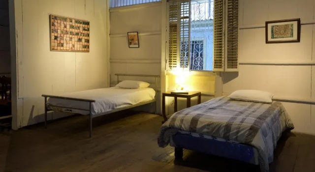 Кровать в общем номере Cino Fabiani Guesthouse