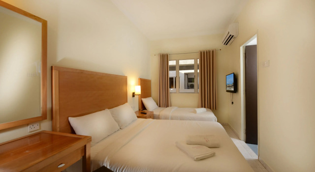 Трёхместный номер Standard Perdana Serviced Apartment & Resorts