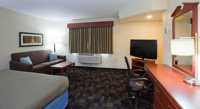Номер Deluxe AmericInn by Wyndham Austin