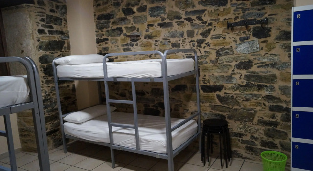 Кровать в общем номере Pension San Anton
