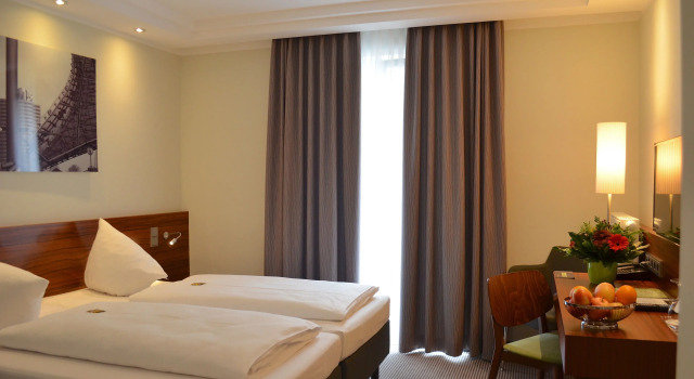 Четырёхместный семейный номер Standard Augusten Hotel München
