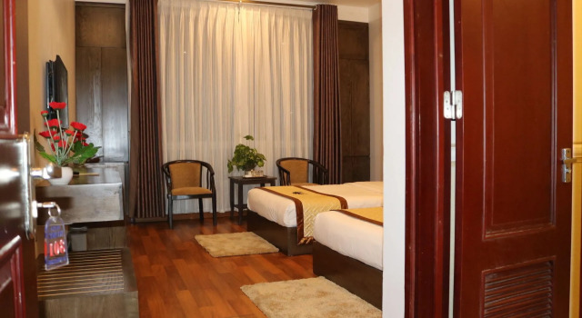 Кровать в общем номере c 1 комнатой с видом на город Ruby Hotel