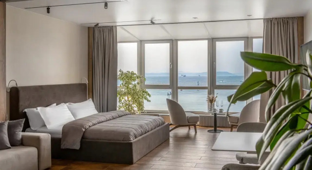 Люкс Семейный с видом на море Меблированные комнаты Singapore sea view by VVO Apartments