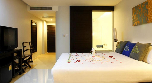 Двухместный номер Grand Deluxe с видом на бассейн Palmyra Patong Resort Phuket - SHA Extra Plus