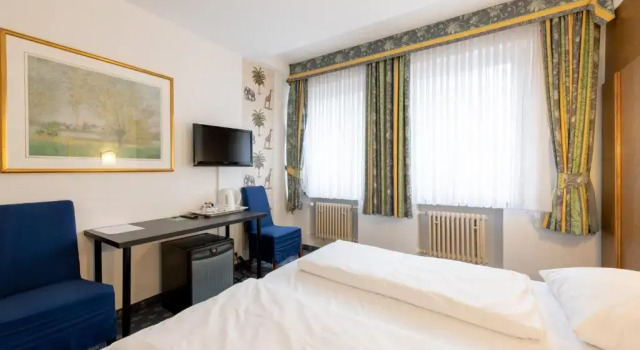 Четырёхместный семейный номер Hotel Königshof The Arthouse