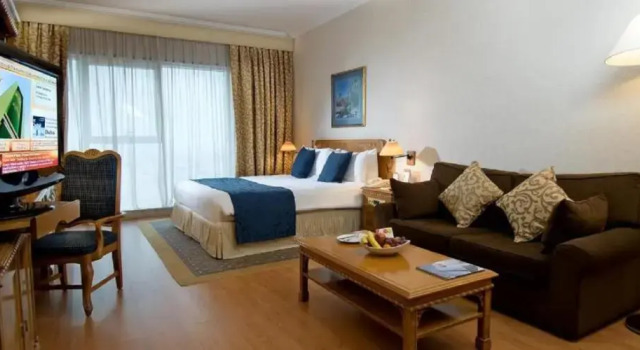 Номер Deluxe Millennium Plaza Downtown Suites