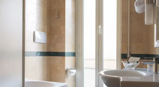 Номер Omnia Superior c панорамным балконом Hotel Santa Costanza by OMNIA hotels