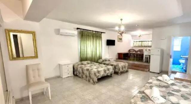 Четырёхместный номер Hotel da Peppe