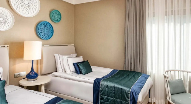Четырёхместный люкс Семейный Titanic Luxury Collection Bodrum