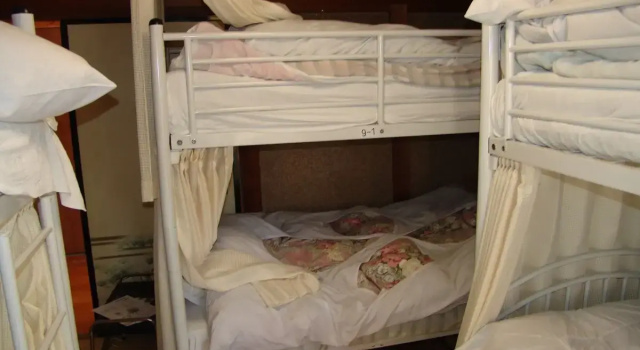 Кровать в общем номере Towadako Backpackers