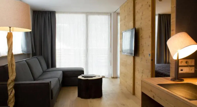 Четырёхместный люкс Sassongher Hotel Col Alto