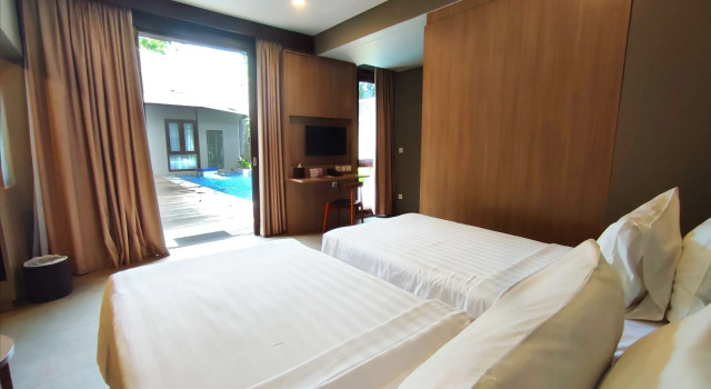 Коттедж с 2 комнатами Gammara Hotel Makassar