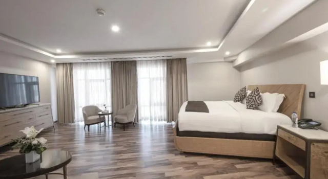 Четырёхместный люкс с видом на Харам Royal с 2 комнатами Rua Al Madinah Hotel EX. Coral
