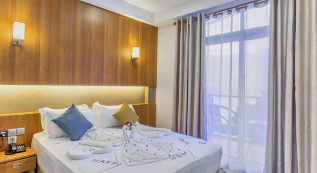 Двухместный номер Deluxe с балконом и с видом на остров Kuredhi Beach Inn