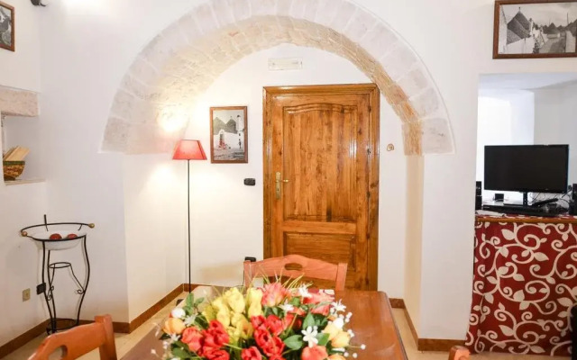 Отель Trulli Vacanze in Puglia Альберобелло комната для гостей