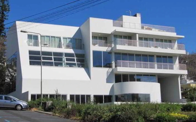Отель Apartamentos Atlântida Lido вид на фасад