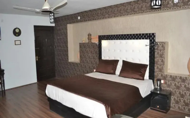 Heavenwood Heritage Hotel By Urban Inn Resorts