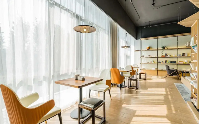 Отель Here Inn Hotel (Beijing Yizhuang) Китай, Пекин - отзывы, цены и фото номеров - забронировать отель Here Inn Hotel (Beijing Yizhuang) онлайн вид на фасад