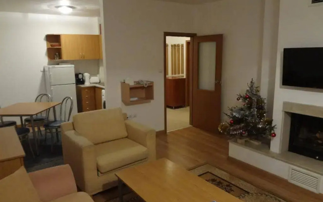 Апартаменты Deluxe Apartments Пампорово комната для гостей