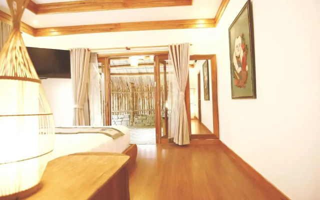 Отель An Bang Sunrise Beach Bungalow вид на фасад