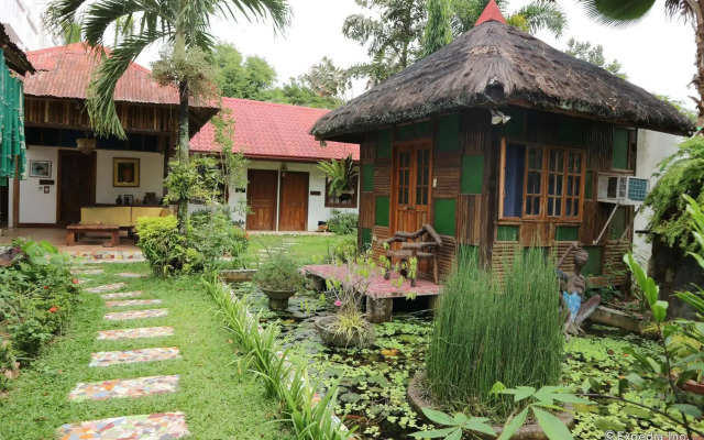 Отель The Lotus Garden Hotel Филиппины, Пуэрто-Принцеса - отзывы, цены и фото номеров - забронировать отель The Lotus Garden Hotel онлайн вид на фасад