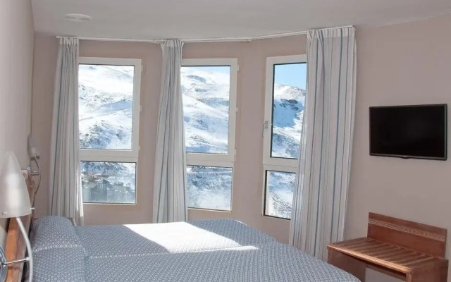 Hotel Reino Nevado комната для гостей