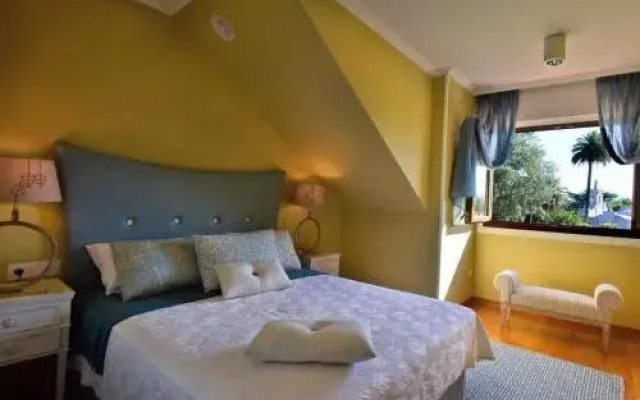 Отель Chalet en la Toja комната для гостей